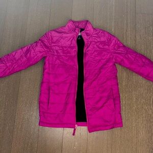 Lands and super lightweight, packable, pink jacket